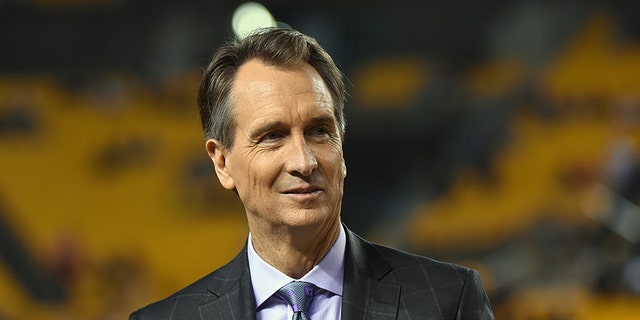 Cris Collinsworth, NBC Sports Sunday Night Football announcer, looks on from the sideline before a game between the Kansas City Chiefs and Pittsburgh Steelers at Heinz Field on October 2, 2016 in Pittsburgh, Pennsylvania.