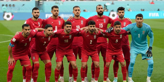 Iranian players pose ahead of the World Cup Group B soccer match between England and Iran at the Khalifa International Stadium in Doha, Qatar, Monday, Nov. 21, 2022.