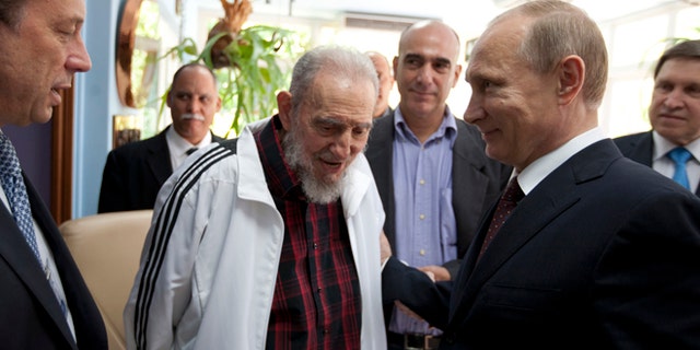 The late Cuban leader, Fidel Castro, meets with Russian President Vladimir Putin in Havana, Cuba, during a visit by the Russian president in 2014. (AP Photo/Alex Castro)