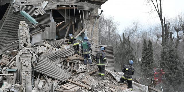 Rescuers work at the site of a maternity ward of a hospital destroyed by a Russian missile attack in Vilniansk, Zaporizhzhia region, Ukraine, Nov. 23, 2022.