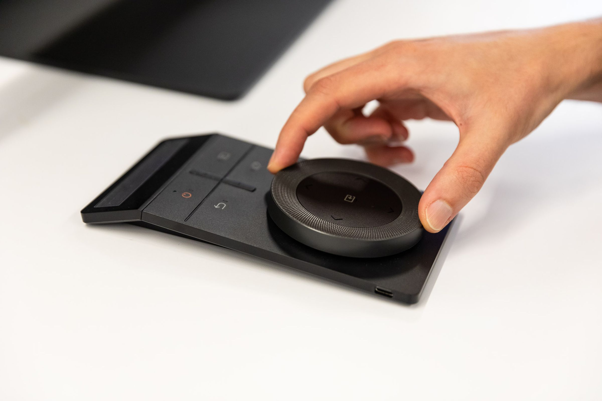 The Ark Dial remote control that’s included with each Samsung Odyssey Ark display.