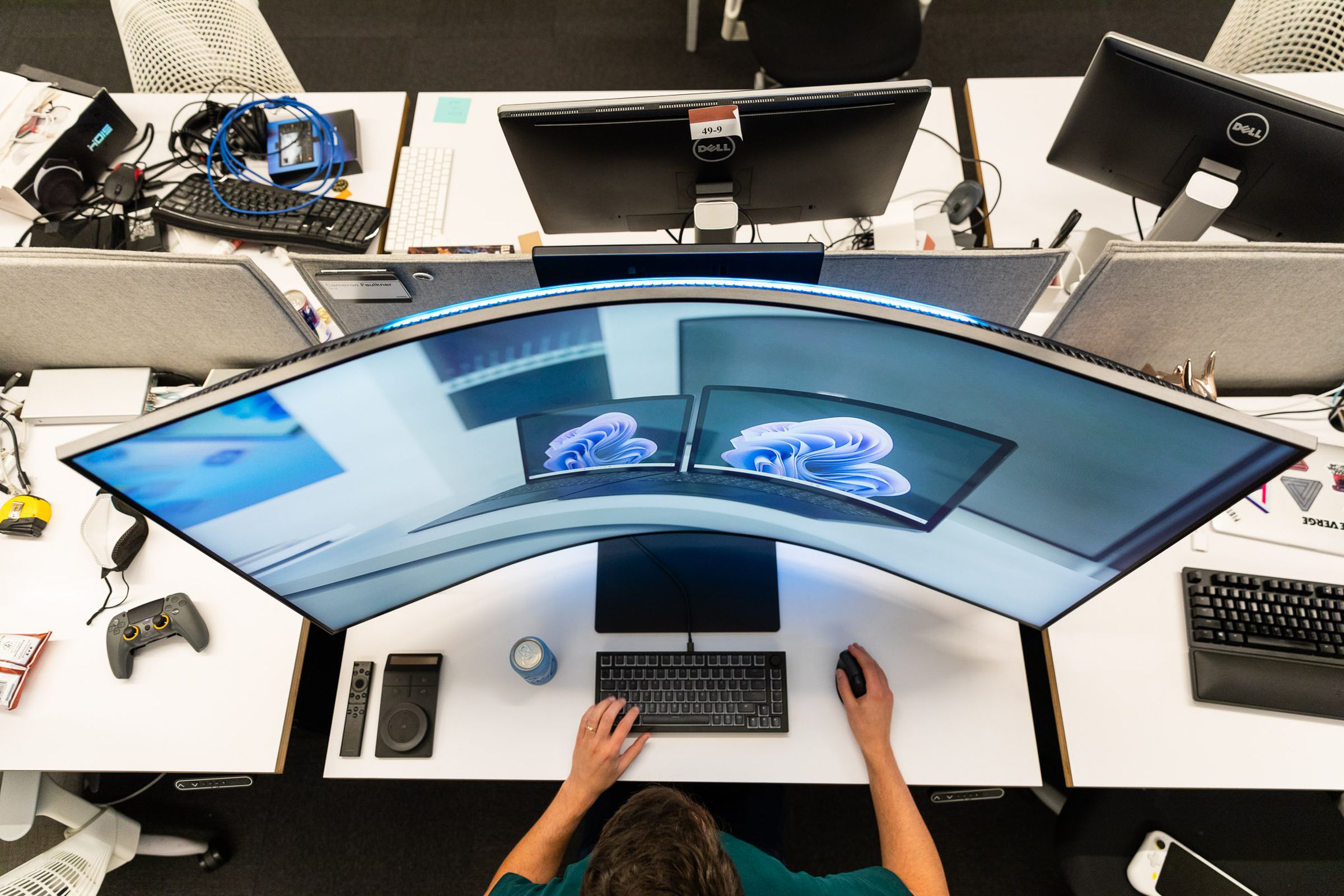 Samsung’s Odyssey Ark gaming display viewed overhead to show off its curve.