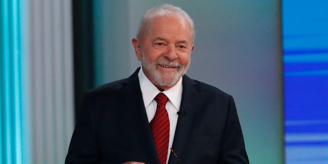 Brazil's former President Luiz Inacio Lula da Silva, who is running for re-election, smiles prior to a presidential debate in Rio de Janeiro, Brazil, Friday, Oct. 28, 2022. Da Silva will face Brazilian President Jair Bolsonaro in a presidential runoff on Oct. 30.