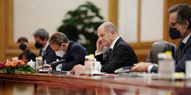 Germany's Chancellor Olaf Scholz, second right, sits opposite Chinese President Xi Jinping, not seen, during their meeting in the Great Hall of the People, Friday, Nov. 4, 2022, in Beijing.