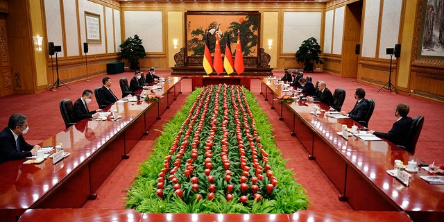 Chinese President Xi Jinping and German Chancellor Olaf Scholz attend a meeting in the Great Hall of the People, Friday, Nov. 4, 2022, in Beijing.