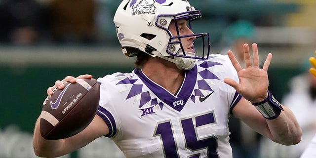 TCU quarterback Max Duggan (15) passes during the first half of an NCAA college football game against Baylor in Waco, Texas, Saturday, Nov. 19, 2022. 