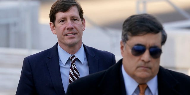 Former Republican state Sen. Brian Kelsey, left, arrives at federal court Tuesday, Nov. 22, 2022, in Nashville, Tenn. Kelsey changed an earlier plea of not guilty to guilty Tuesday, on charges of violating federal campaign finance laws. 