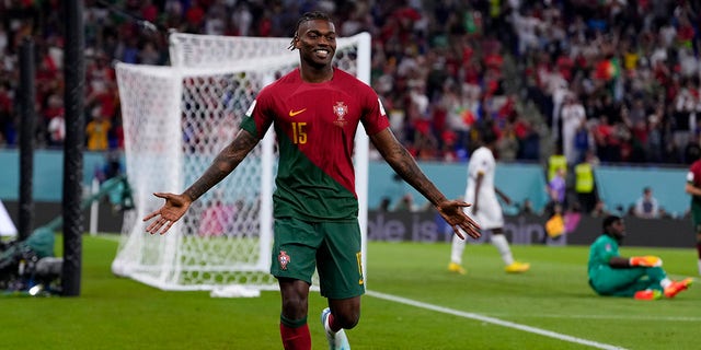 Portugal's Rafael Leao celebrates scoring his side's third goal against Ghana during a World Cup Group H soccer match at the Stadium 974 in Doha, Qatar, Thursday, Nov. 24, 2022. 