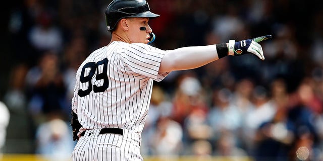 Yankees right fielder Aaron Judge reacts after hitting a double against the Minnesota Twins, Sept. 5, 2022, in New York.