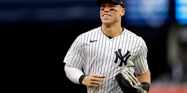 Yankees right fielder Aaron Judge runs to the dugout during the Baltimore Orioles game on Oct. 1, 2022, in New York.