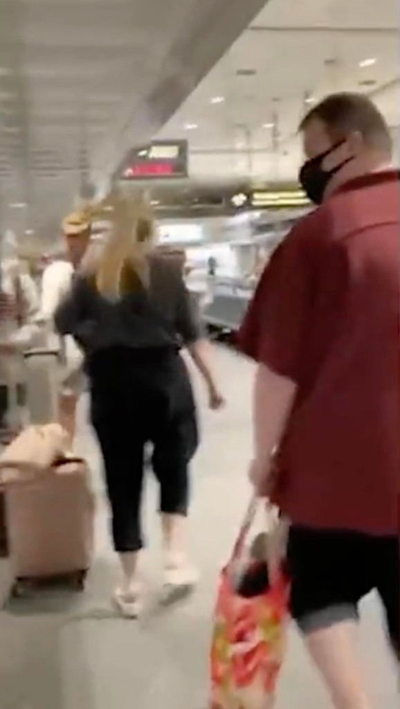 Anderson Aldrich and his mother at an airport.