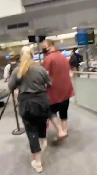 Anderson Aldrich as an airport with his mother.