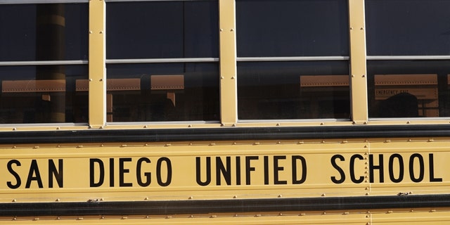 San Diego Unified School District signage is seen on a Navistar International Corp. school bus at the San Diego Unified School District Transportation Department in San Diego, California, U.S., on Thursday, July 9, 2020. 