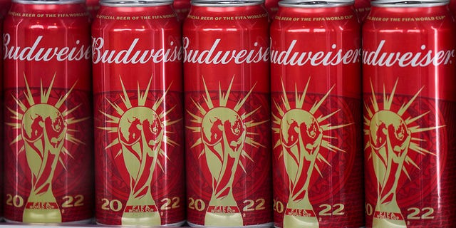 Budweiser cans are lined up in a cooler at the World Cup media center at the Qatar National Convention Center, in Sunday, Nov. 20, 2022.