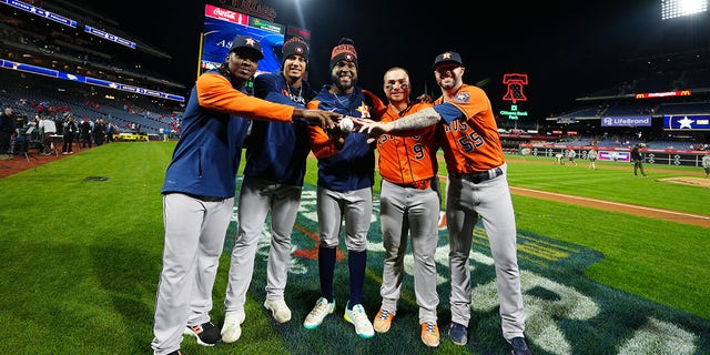 Rafael Montero, Bryan Abreu, Cristian Javier, Christian Vázquez and Ryan Pressly of the Houston Astros pose for a photo after their combined no-hitter against the Phillies in Game 4 of the 2022 World Series at Citizens Bank Park Nov. 2, 2022, in Philadelphia.