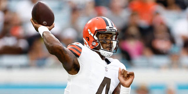 Cleveland Browns quarterback Deshaun Watson, #4, looks to throw the ball during the first quarter of a preseason game against the Jacksonville Jaguars at TIAA Bank Field In Jacksonville, Florida, Aug. 12, 2022.