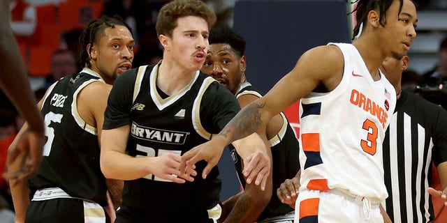 Doug Edert of the Bryant University Bulldogs reacts after slapping Judah Mintz of the Syracuse Orange on Nov. 26, 2022, in Syracuse, New York.