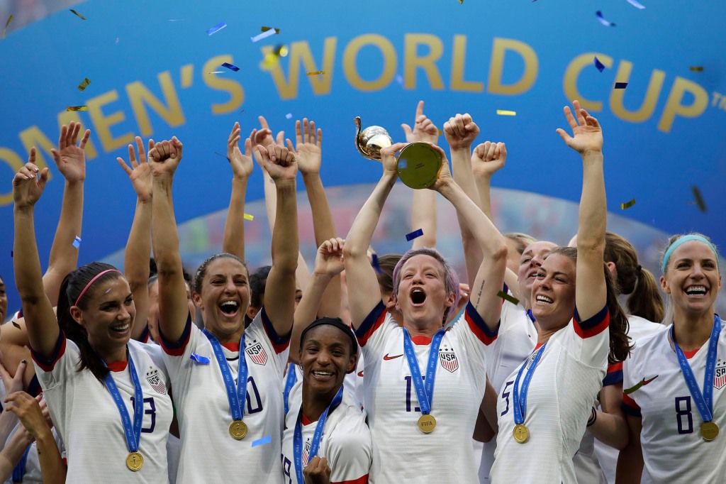 United States' Megan Rapinoe lifts up the trophy after winning the Women's World Cup final soccer match between US and The Netherlands at the Stade de Lyon in Decines, outside Lyon, France, in July 7, 2019.