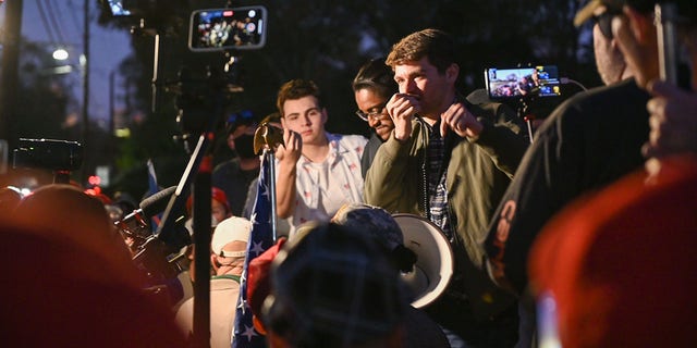 Nick Fuentes speaks during a "Stop the Steal" rally outside the Governor's Mansion in Georgia on November 19th, 2020. 