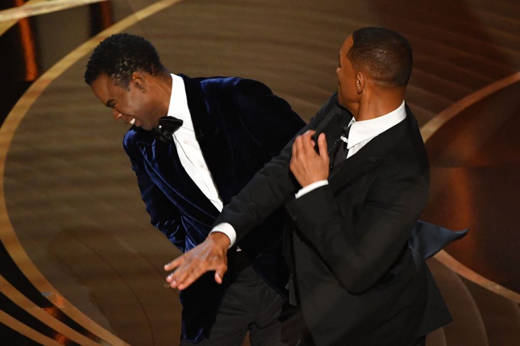 Will Smith slaps Chris Rock onstage during the 94th Oscars at the Dolby Theatre in Hollywood, Calif., on March 27, 2022.