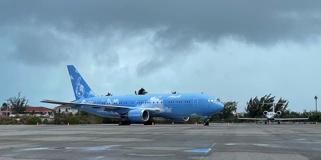 This photograph taken on Feb. 25, 2022, shows the Boeing 767 airplane dubbed "Air Drake" belonging to Canadian recording-artist Drake, parked on a runway in Providenciales, Turks and Caicos Islands. 