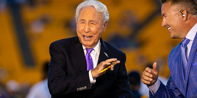 ESPN "College GameDay" analyst Lee Corso and Kirk Herbstreit during a game between the West Virginia Mountaineers and the Pittsburgh Panthers Sept. 1, 2022, at Acrisure Stadium in Pittsburgh.