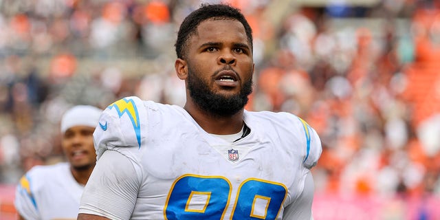 Los Angeles Chargers defensive tackle Jerry Tillery (99) leaves the field following the National Football League game between the Los Angeles Chargers and Cleveland Browns on October 9, 2022, at FirstEnergy Stadium in Cleveland, OH. 