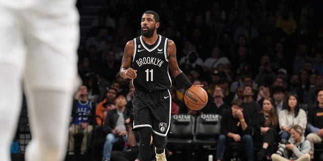 Kyrie Irving of the Brooklyn Nets dribbles the ball during a game against the Dallas Mavericks Oct. 27, 2022, at Barclays Center in Brooklyn, N.Y.