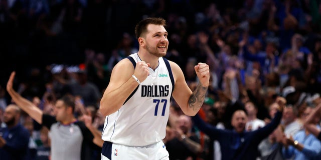 Luka Doncic, #77 of the Dallas Mavericks, reacts after a three point basket against the Utah Jazz in the second half at American Airlines Center on Nov. 2, 2022 in Dallas.