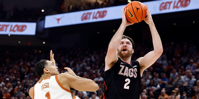 Gonzaga forward Drew Timme makes a shot over Texas forward Dylan Disu at the Moody Center in Austin on Nov. 16, 2022.