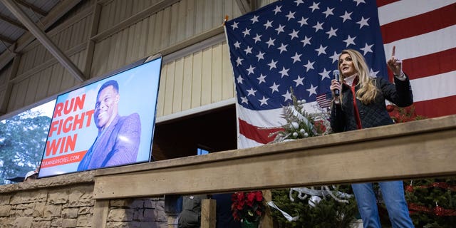 Former Georgia Sen. Kelly Loeffler campaigns for Republican Senate nominee Herschel Walker during a rally on Nov. 21, 2022, in Milton, Georgia.