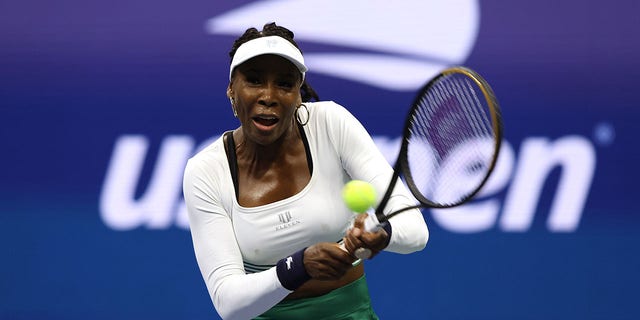 Venus Williams plays a backhand with partner Serena Williams, of the United States, against Lucie Hradecka and Linda Noskova, of Czech Republic, during the Women’s Doubles First Round match during their Men's Singles Second Round match on Day Four of the 2022 US Open at USTA Billie Jean King National Tennis Center on Sept. 1, 2022 in the Flushing neighborhood of the Queens borough of New York City. 