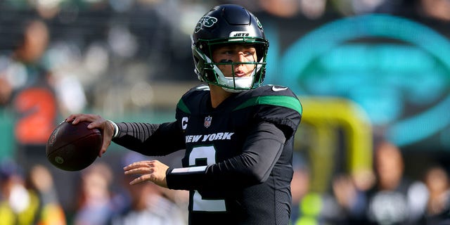 Zach Wilson, #2 of the New York Jets, throws the ball during the first half against the New England Patriots at MetLife Stadium on Oct. 30, 2022 in East Rutherford, New Jersey. 