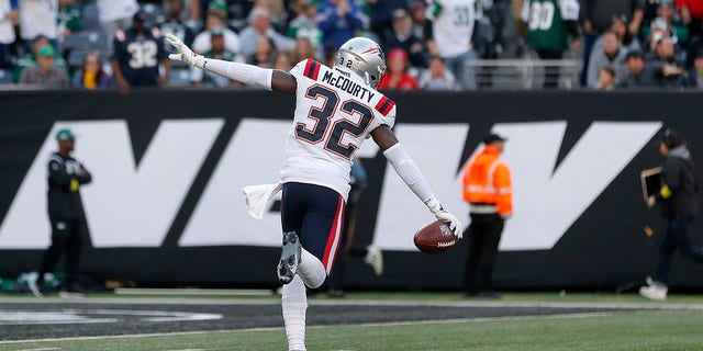 Devin McCourty #32 of the New England Patriots in action against the New York Jets at MetLife Stadium on October 30, 2022 in East Rutherford, New Jersey. The Patriots defeated the Jets 22-17. 