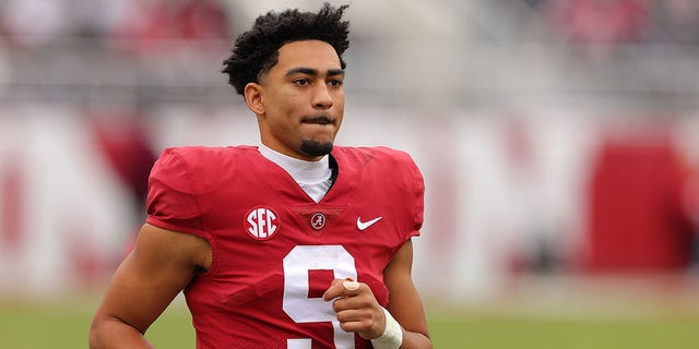 Bryce Young of the Alabama Crimson Tide runs to the huddle in the fourth quarter against the Austin Peay Governors at Bryant-Denny Stadium Nov. 19, 2022, in Tuscaloosa, Ala. 