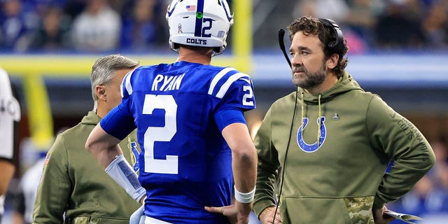 Matt Ryan #2 of the Indianapolis Colts talks to head coach Jeff Saturday of the Indianapolis Colts during the third quarter against the Philadelphia Eagles at Lucas Oil Stadium on November 20, 2022 in Indianapolis, Indiana. 