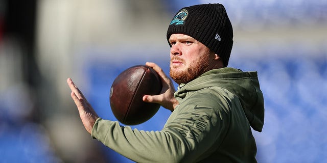 Sam Darnold, #14 of the Carolina Panthers, throws before the game against the Baltimore Ravens at M&amp;T Bank Stadium on Nov. 20, 2022 in Baltimore.