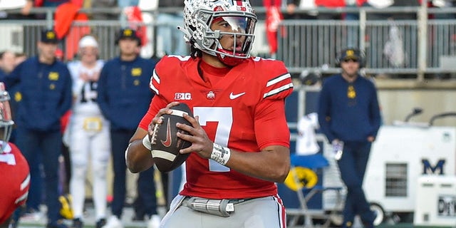 C.J. Stroud of the Ohio State Buckeyes looks to throw against the Michigan Wolverines at Ohio Stadium on Nov. 26, 2022 in Columbus.