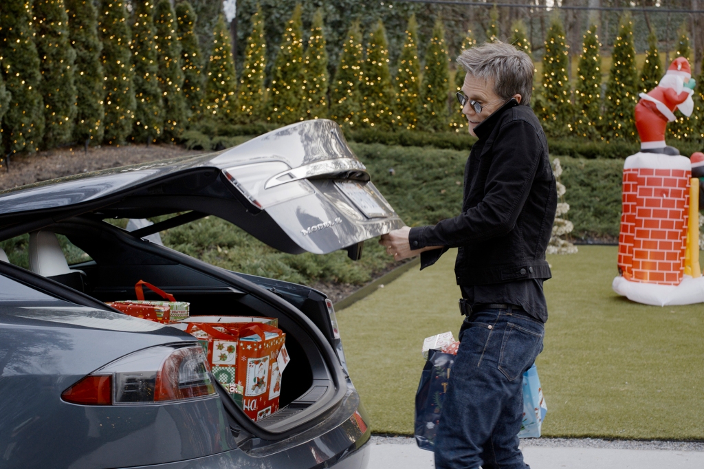 Kevin Bacon unloads holiday presents from his car before an unfortunate altercation with a couple of well-meaning but misguided Guardians.
