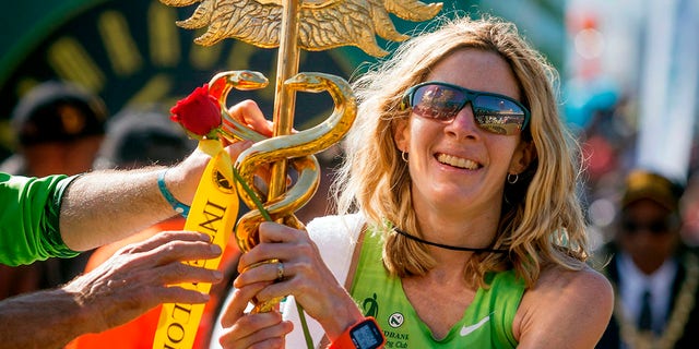 United States long-distance runner Camille Herron reacts after winning the 89km Comrades Marathon between Durban and Pietermaritzburg, South Africa, on June 4, 2017, in Pietermaritzburg. The annual ultra marathon attracted over 17,000 runners from around the world.