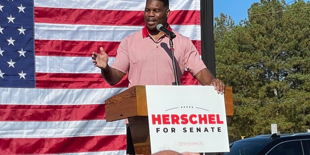 Republican Senate nominee Herschel Walker of Georgia holds a campaign rally Oct. 27, 2022, in Cumming, Ga.