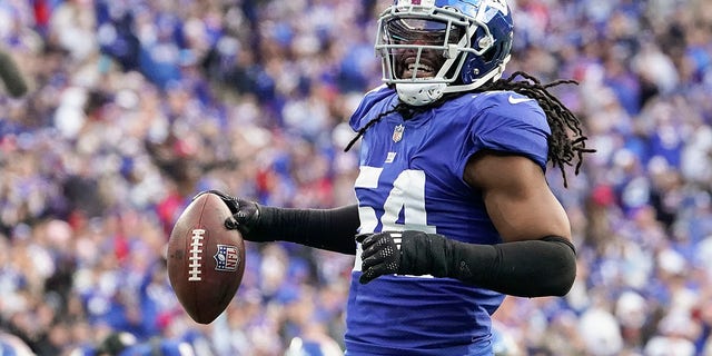 New York Giants linebacker Jaylon Smith, #54, reacts after a defensive play against the Houston Texans during the fourth quarter of an NFL football game, Sunday, Nov. 13, 2022, in East Rutherford, New Jersey.