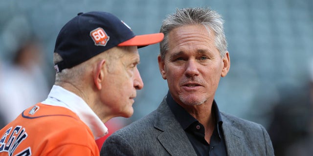 Jim McIngvale, aka "Mattress Mack," left, talks with former Houston Astros second baseman Craig Biggio before Game 2 of the ALCS at Minute Maid Park in Houston on Oct. 20, 2022.