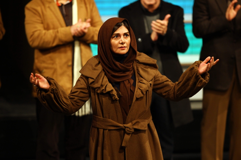 Hengameh Ghaziani receives the Crystal Simorgh for best actress in the film "Days of Life" during Day 9 of the 30th International Fajr Film Festival on February 12, 2012 in Tehran, Iran.