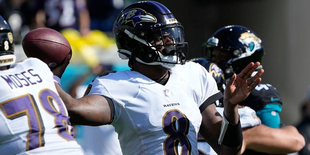 Baltimore Ravens quarterback Lamar Jackson (8) passes the ball during the first half against the Jacksonville Jaguars, Nov. 27, 2022, in Jacksonville, Florida.