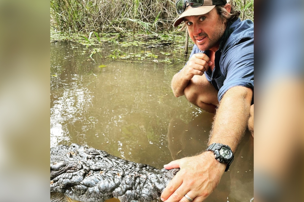 Matt Wright petting gator.