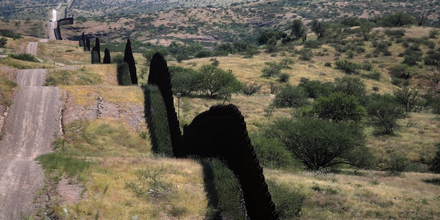 The U.S. border wall with Mexico is seen from the United States in Nogales, Arizona.