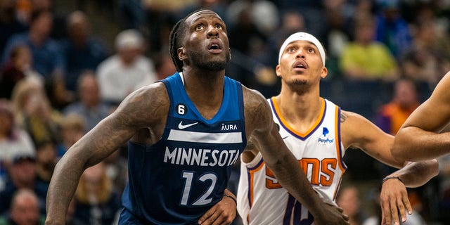 MINNEAPOLIS, MN - NOVEMBER 9: Taurean Prince, #12 of the Minnesota Timberwolves, and Damion Lee, #10 of the Phoenix Suns, position for a rebound in the third quarter of the game at Target Center on November 9, 2022 in Minneapolis, Minnesota. 