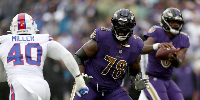 Baltimore Ravens offensive tackle Morgan Moses, center, blocks Buffalo Bills linebacker Von Miller at M&amp;T Bank Stadium in Baltimore, Maryland, on Oct. 02, 2022.