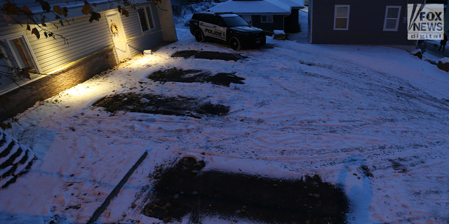 Four empty parking spots are seen outside the Moscow, Idaho home where four college students were murdered. The cars were towed away to use for "further evidence."